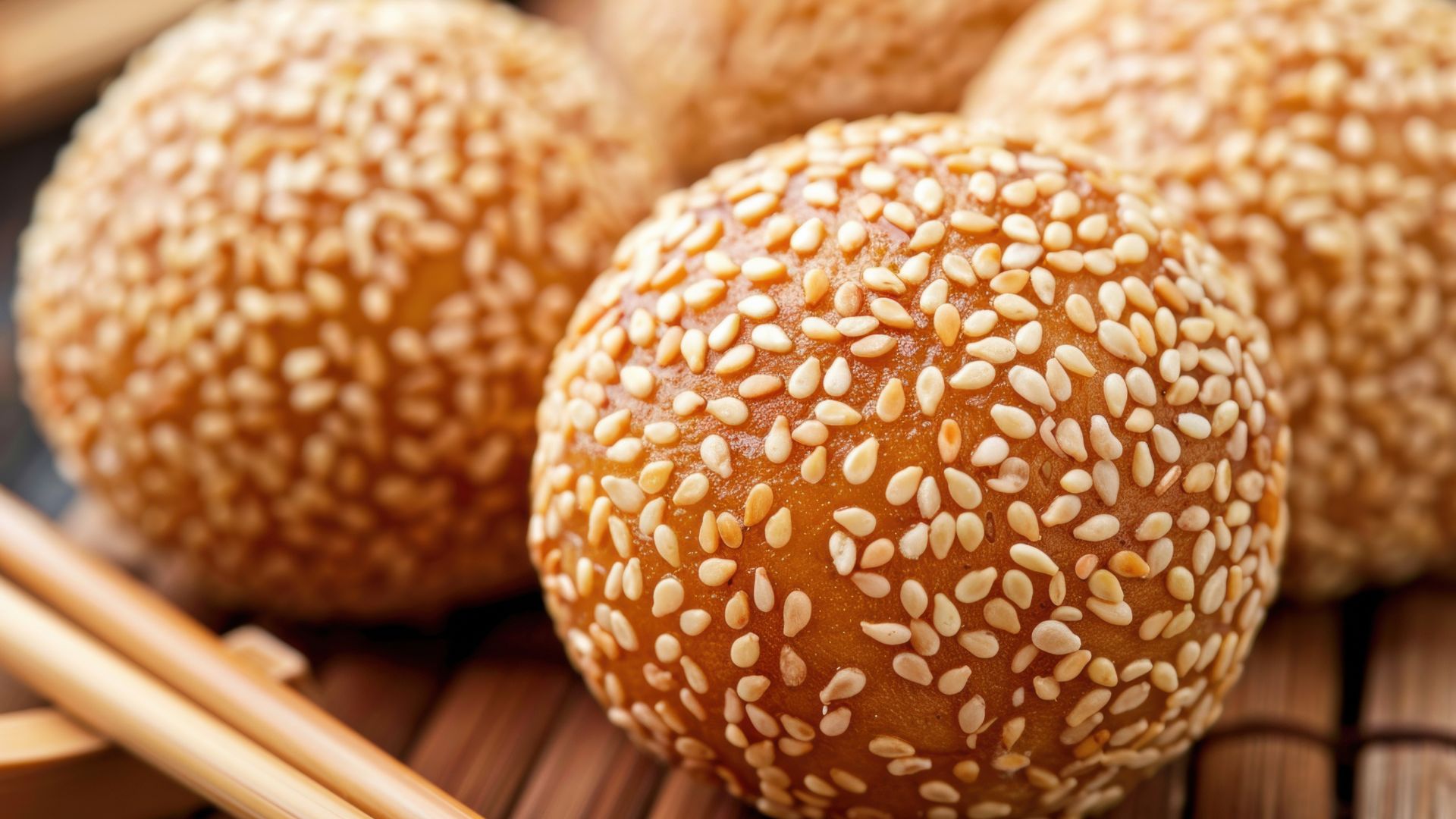 פיזור שומשום על לחמניות